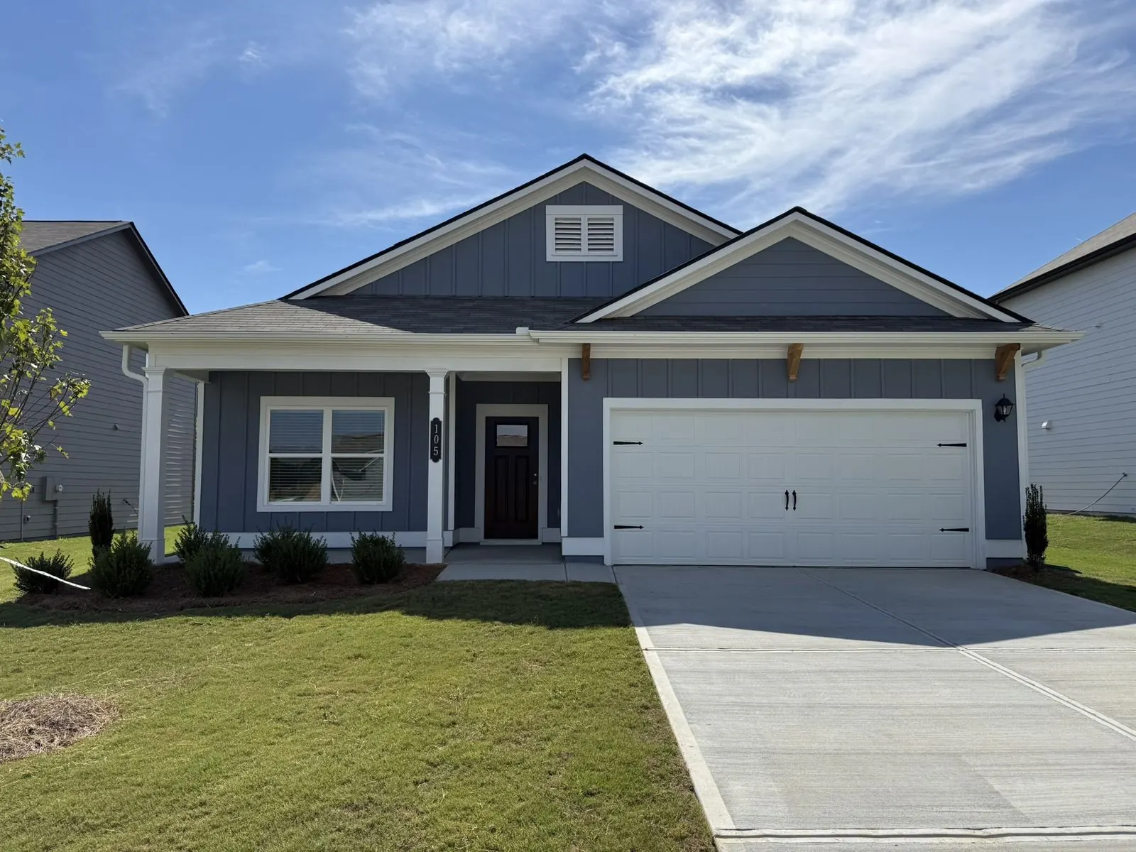 Front of the single-story house with a 2-car garage, 105 Alcovy Trl