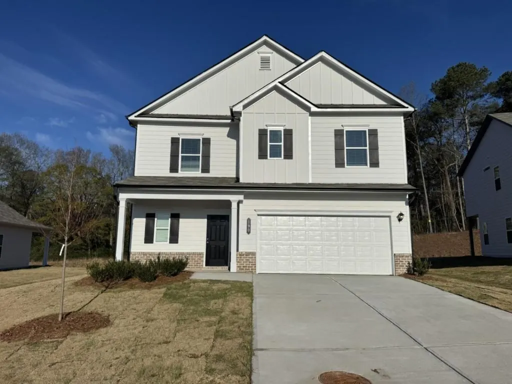 Front of the two-story house with a 2-car garage, 190 Fair Oak Ln